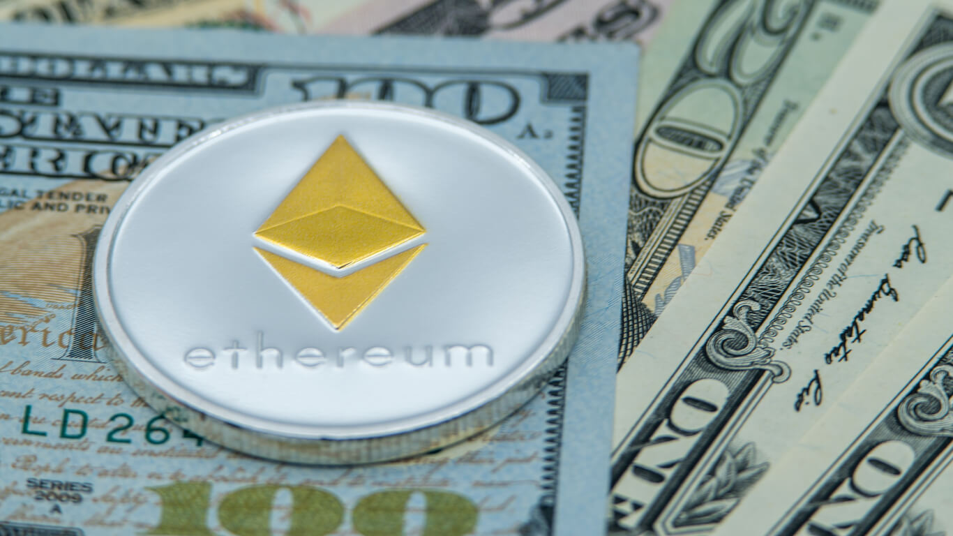 ethereum coin sitting on top notes
