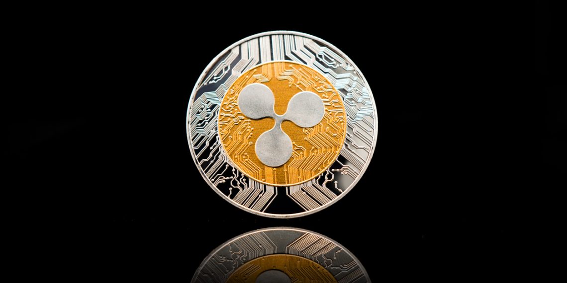 ripple xrp crypto coin on black background