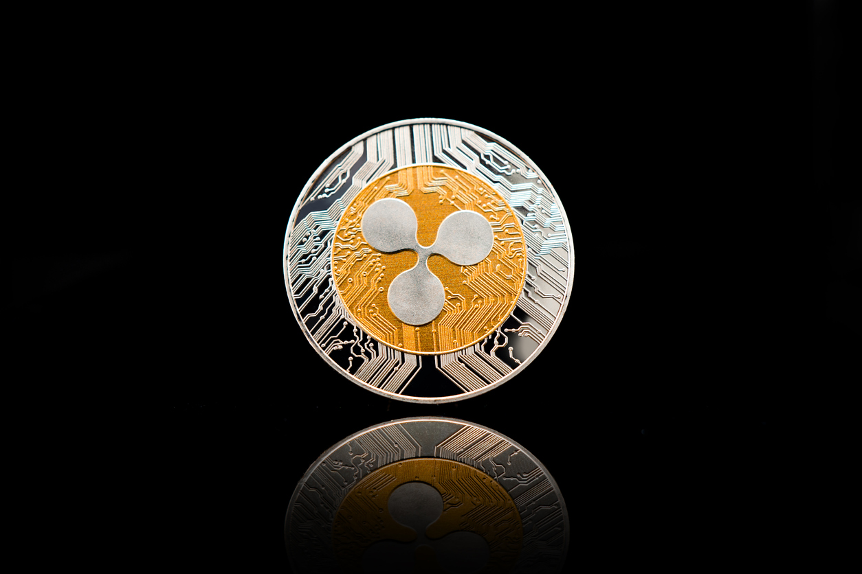 ripple xrp crypto coin on black background