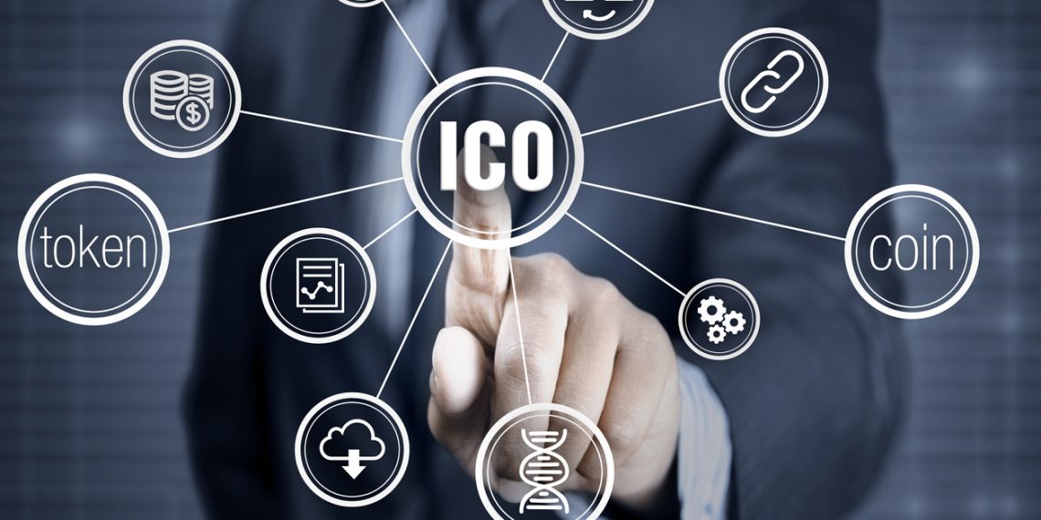 Finger pointing into the ico - initial coin offering