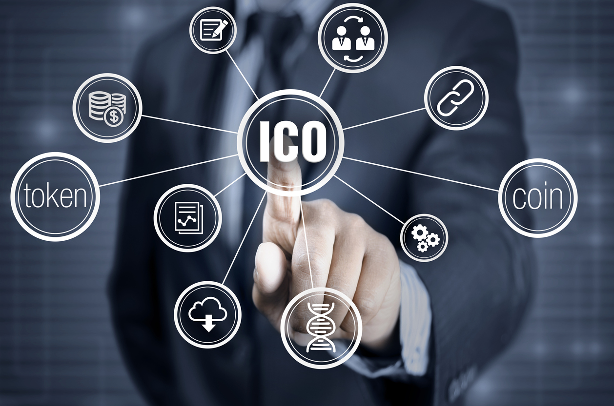 Finger pointing into the ico - initial coin offering