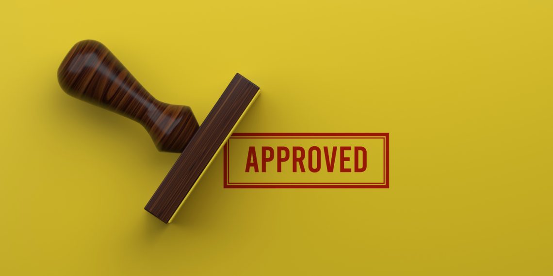 APPROVED Rubber Stamp On Yellow Background 3D Rendering