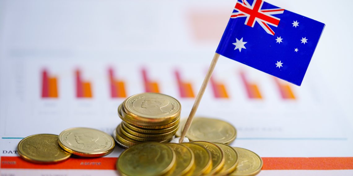 Australia flag with coins on graph background